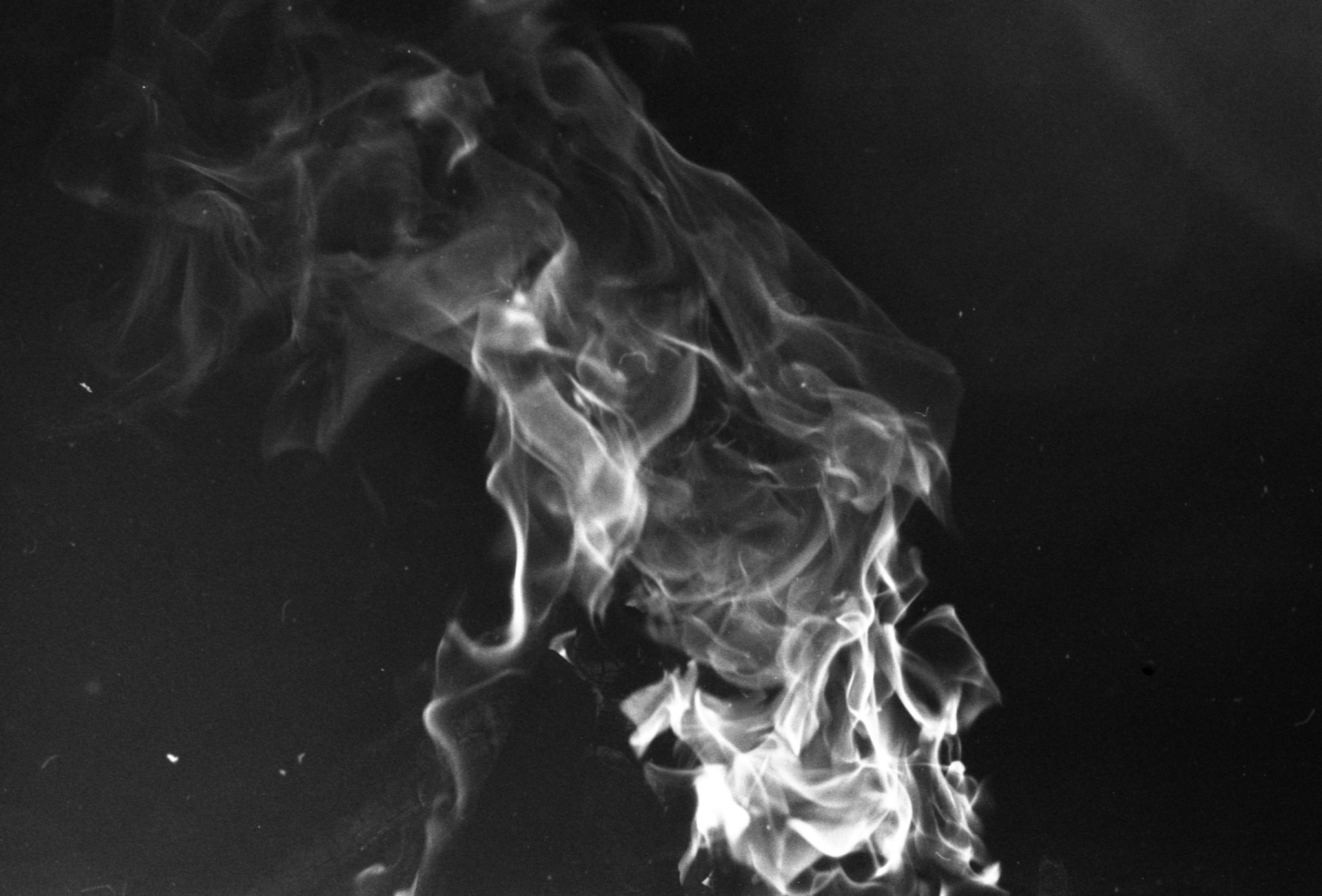 A monochrome photograph of flames